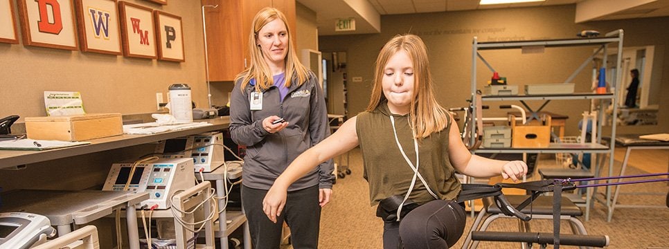 Ridgeview Rehab Staff working with Patient On Resistance Training