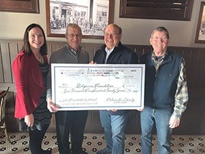 Photo of the Charity Lake Minnetonka Invitational Check Presentation