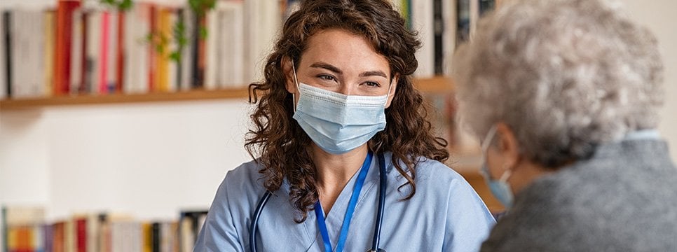 Nurse talking with patient