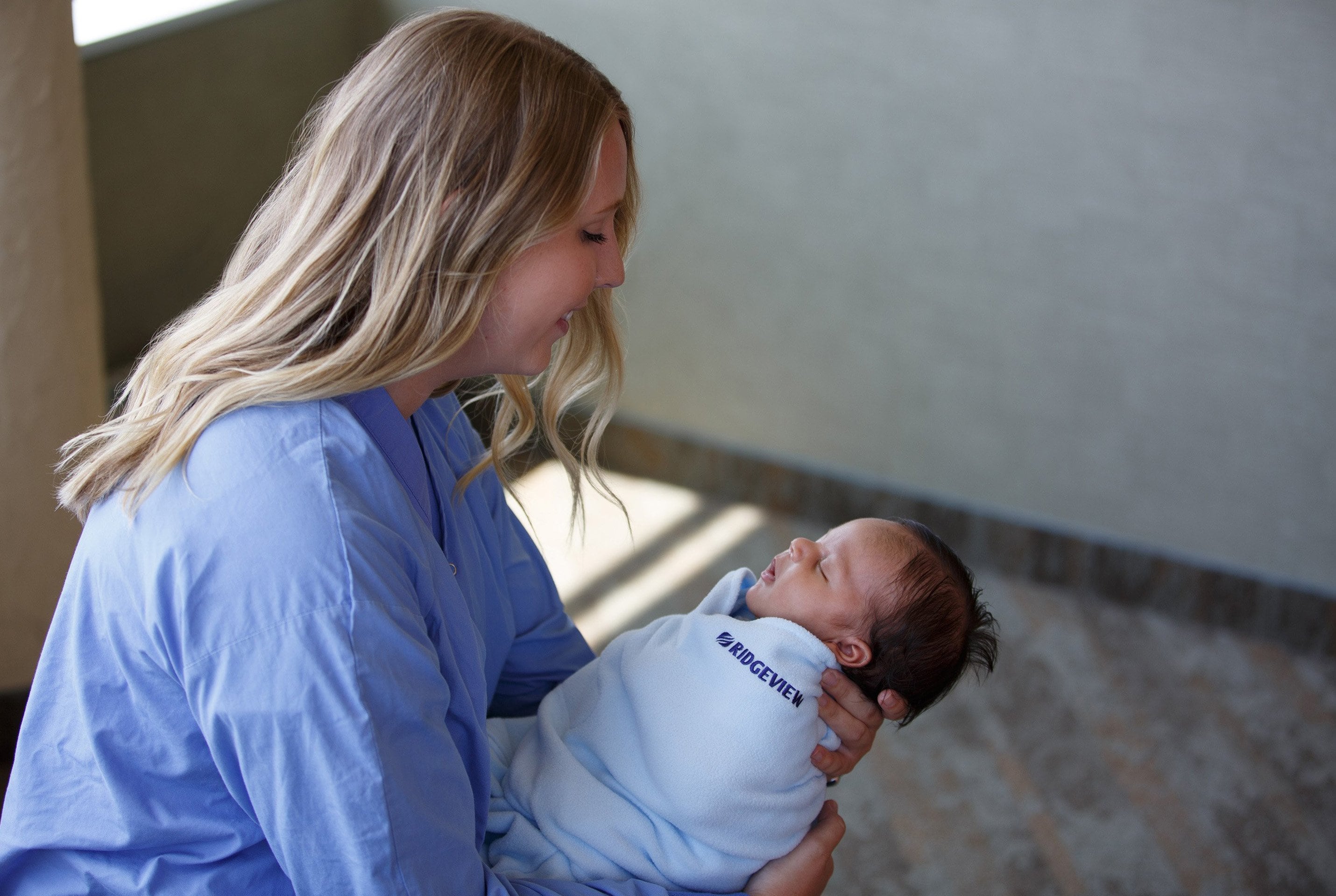 Photo of Nurse and New Born Baby