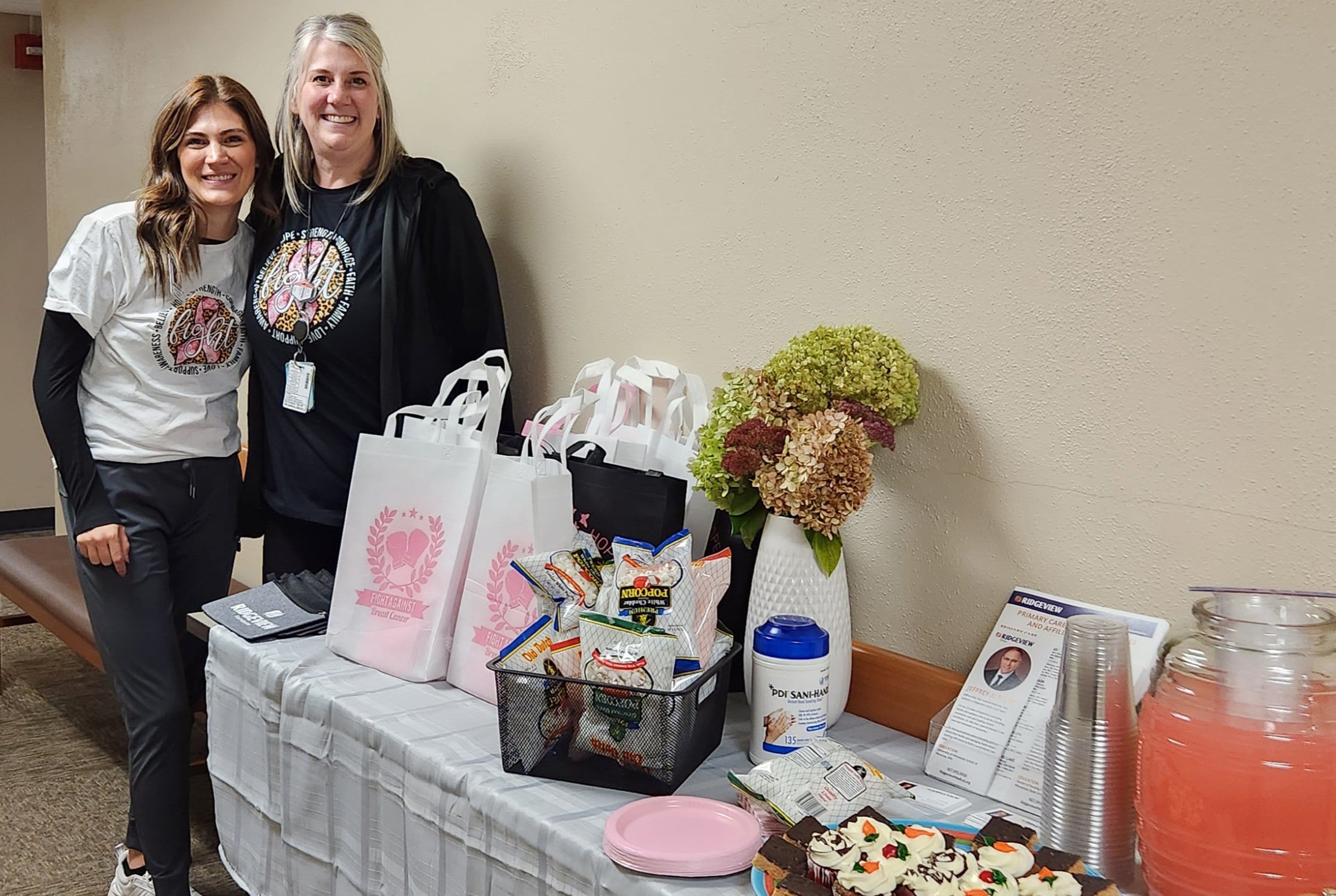 Photo of Employees at a breast cancer event