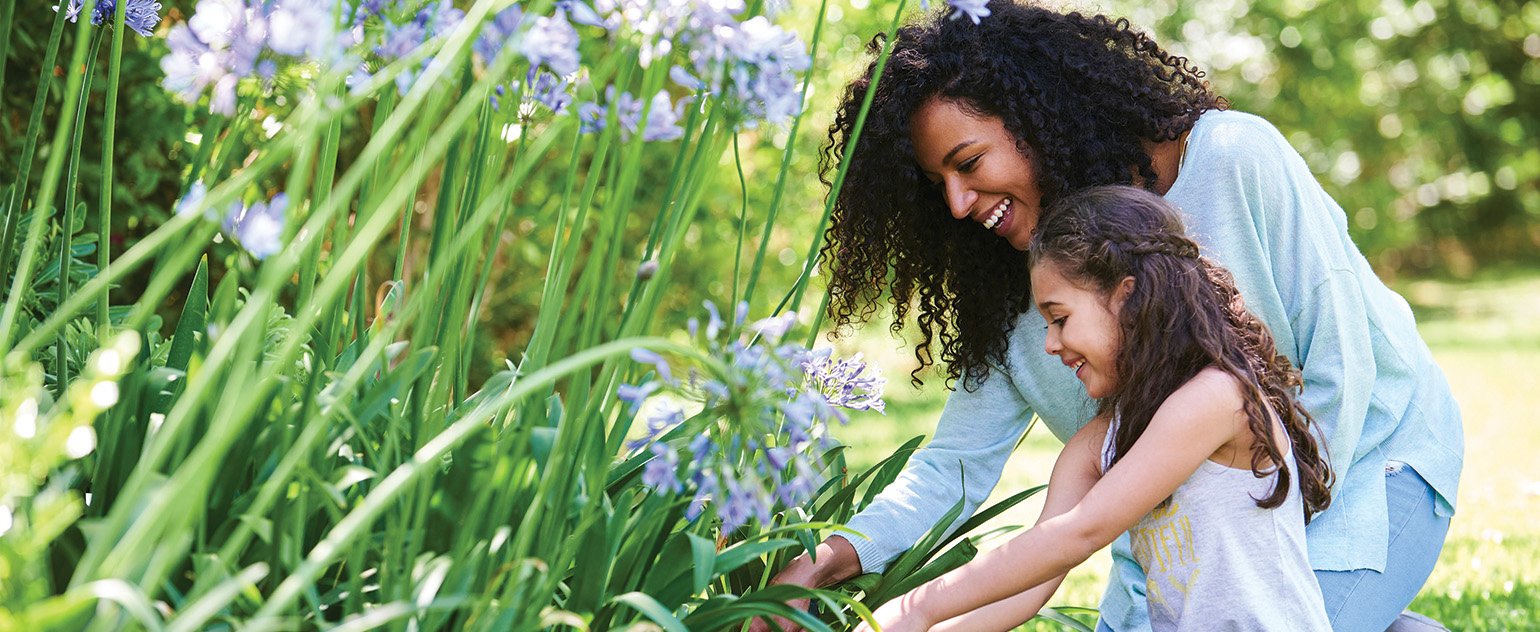 image of mother and daughter in garden